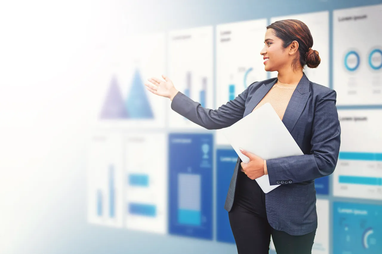 An AI-generated image of a woman presenting charts on a wall of displays.