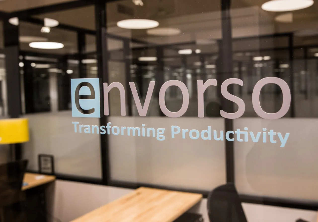 An AI-generated image of the Envorso name on the glass wall of an office.